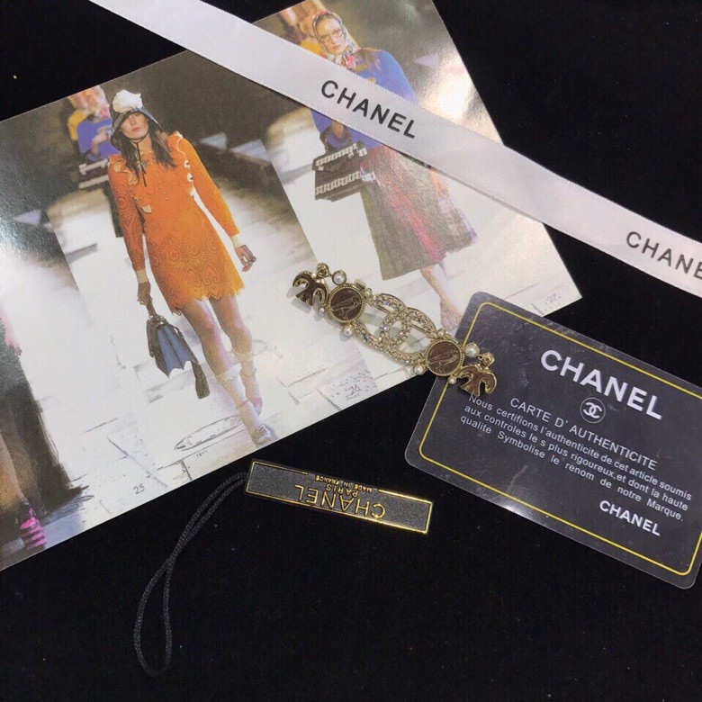 Ch*el brooches